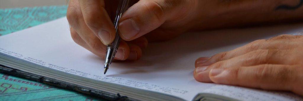 An essayist preparing notes before writing essays using ChatGPT.