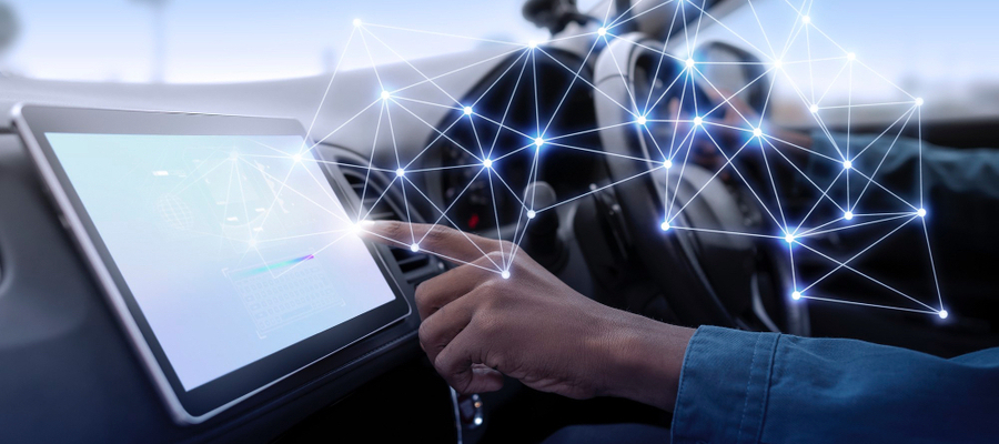 A driver using a touch screen used for automated vehicles