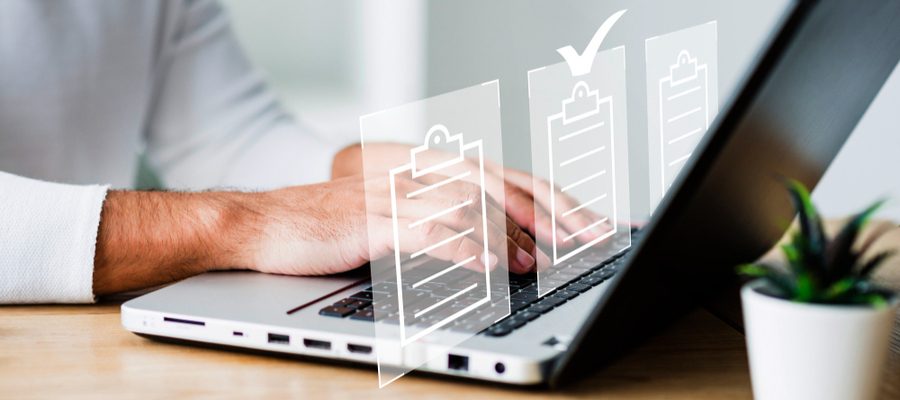 A laptop user following set steps to check for cybersecurity malicious compliance.