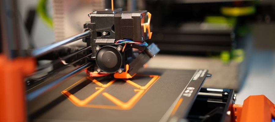 What is additive manufacturing? A 3D machine at work answers this question.