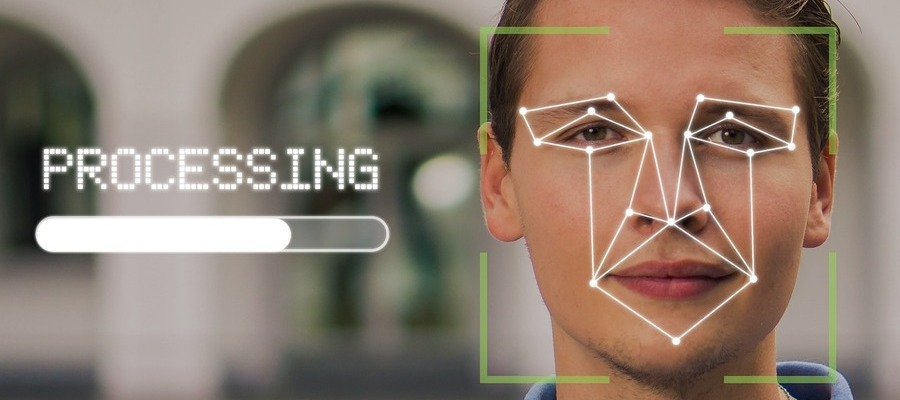 What is biometric authentication? A man's face is being scanned for identification with key points being picked around eyes, nose and mouth.